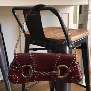 Deep Red Studded Handbag With Horse Bit Closure